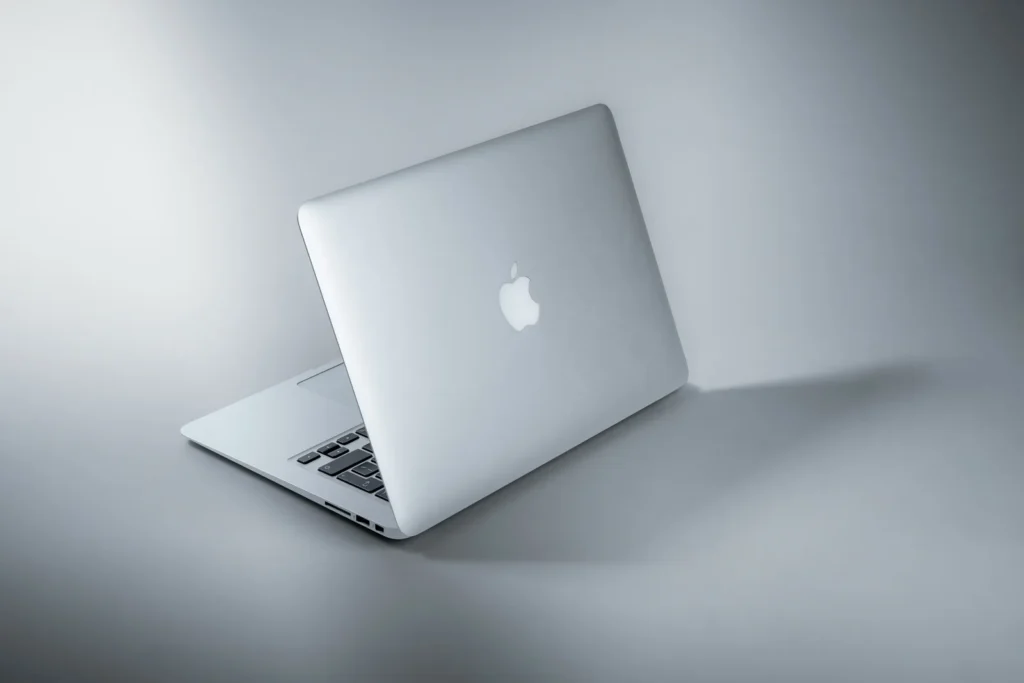 Silver laptop on a white desk