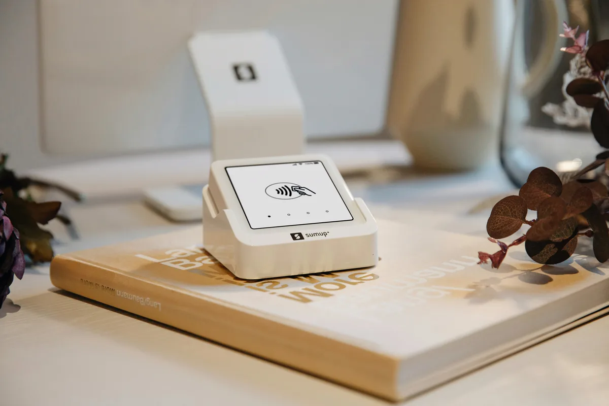 Card payment reader on a notebook